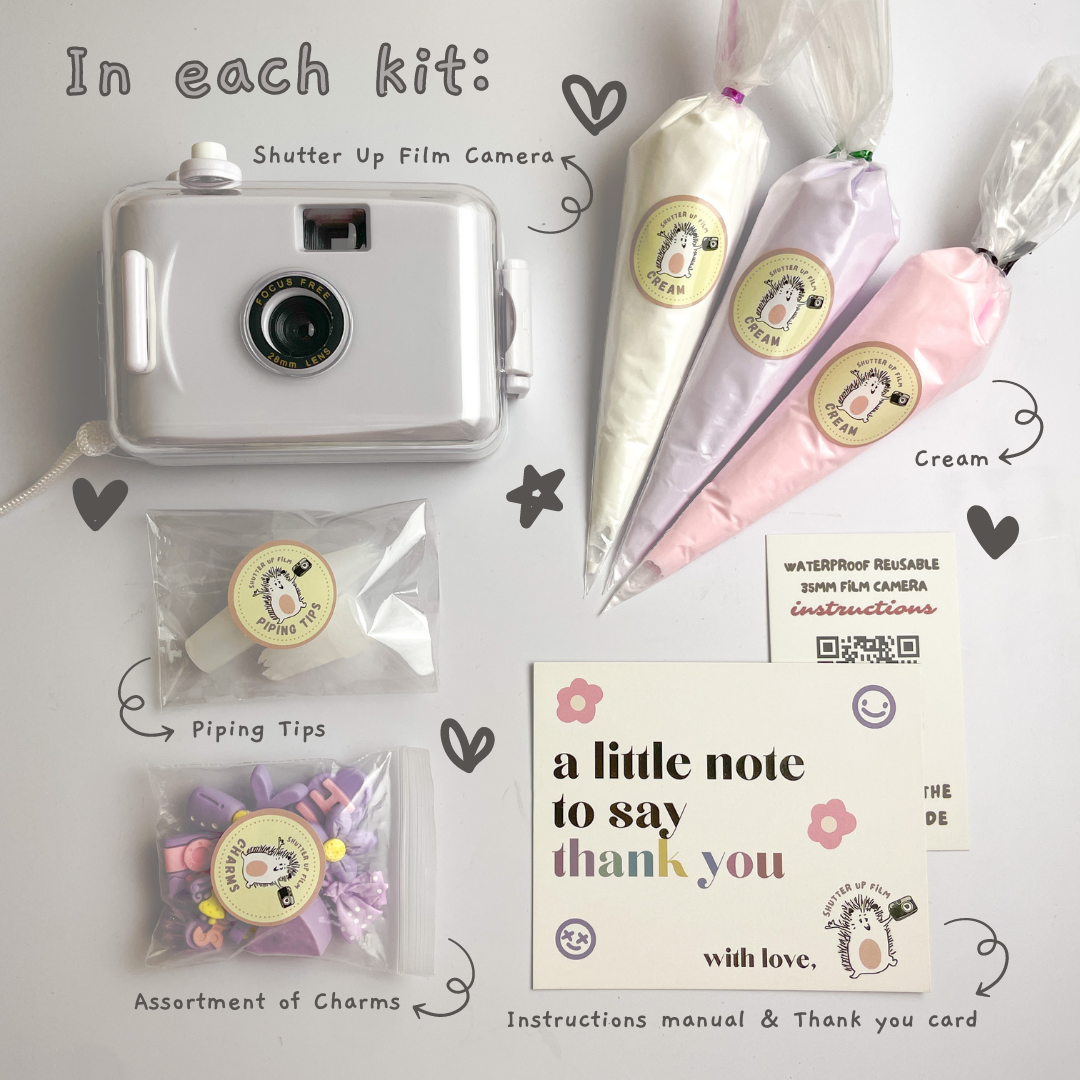 What is in each Shutter Up Film Decoden DIY Kit with 3 artificial cream, 10-15 charms and piping tips, start shooting film now!
